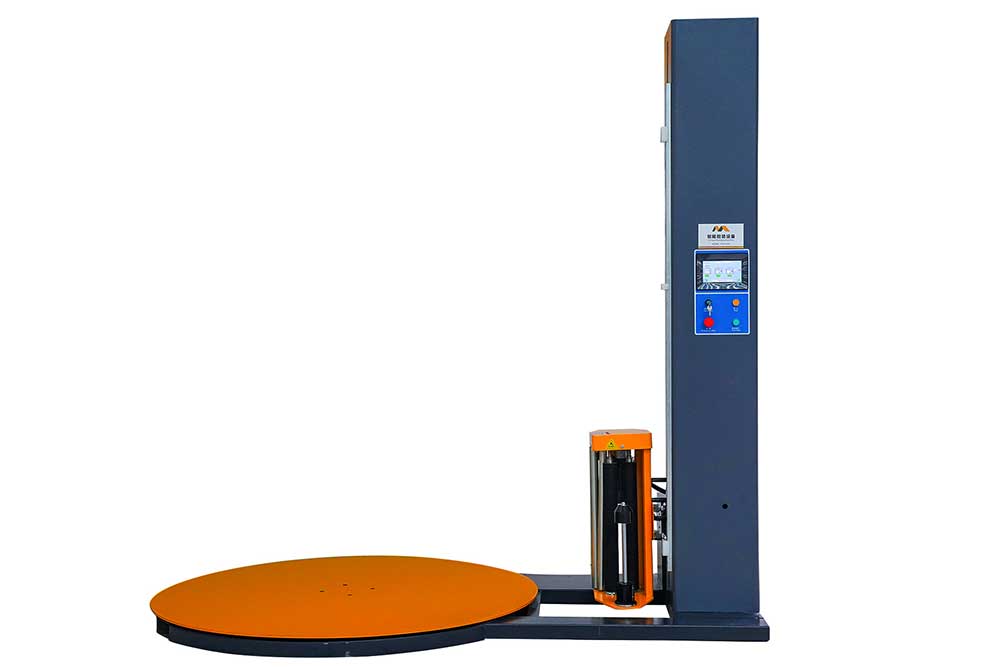 Industrial pallet wrapping machine stabilizing loads for secure logistics operations.