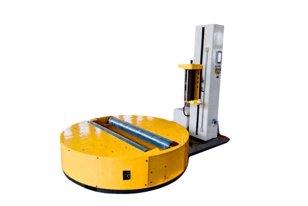 High-speed roll pallet wrapping machine stabilising cylindrical loads.