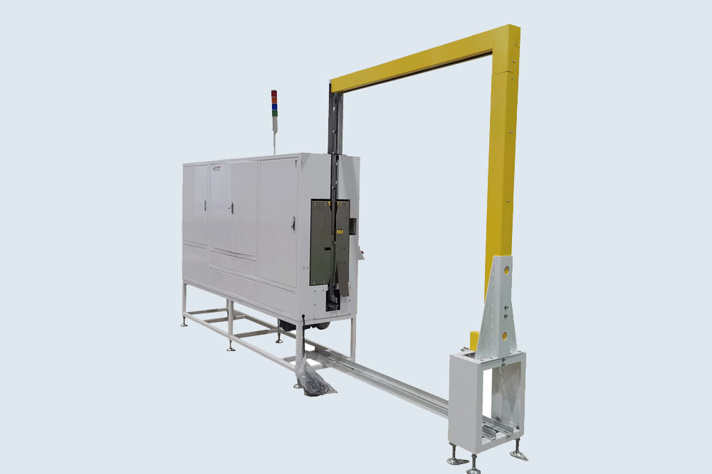 Heavy-duty pallet strapping machine reinforcing shipments with steel/polyester bands.