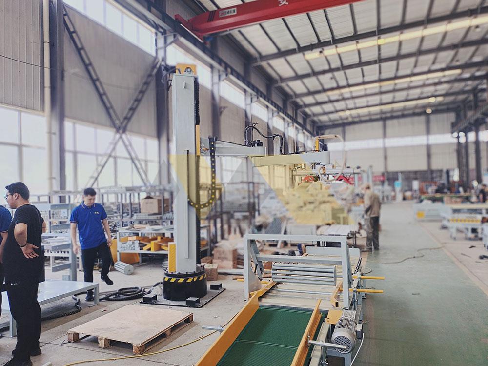 industrial robotic palletizer machine working in factory production line palletizer machine