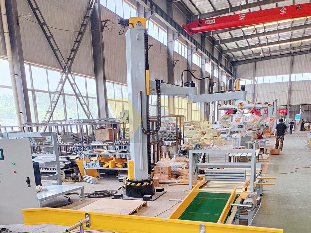 engineers calculating palletizer ROI on interactive screen palletizer machine