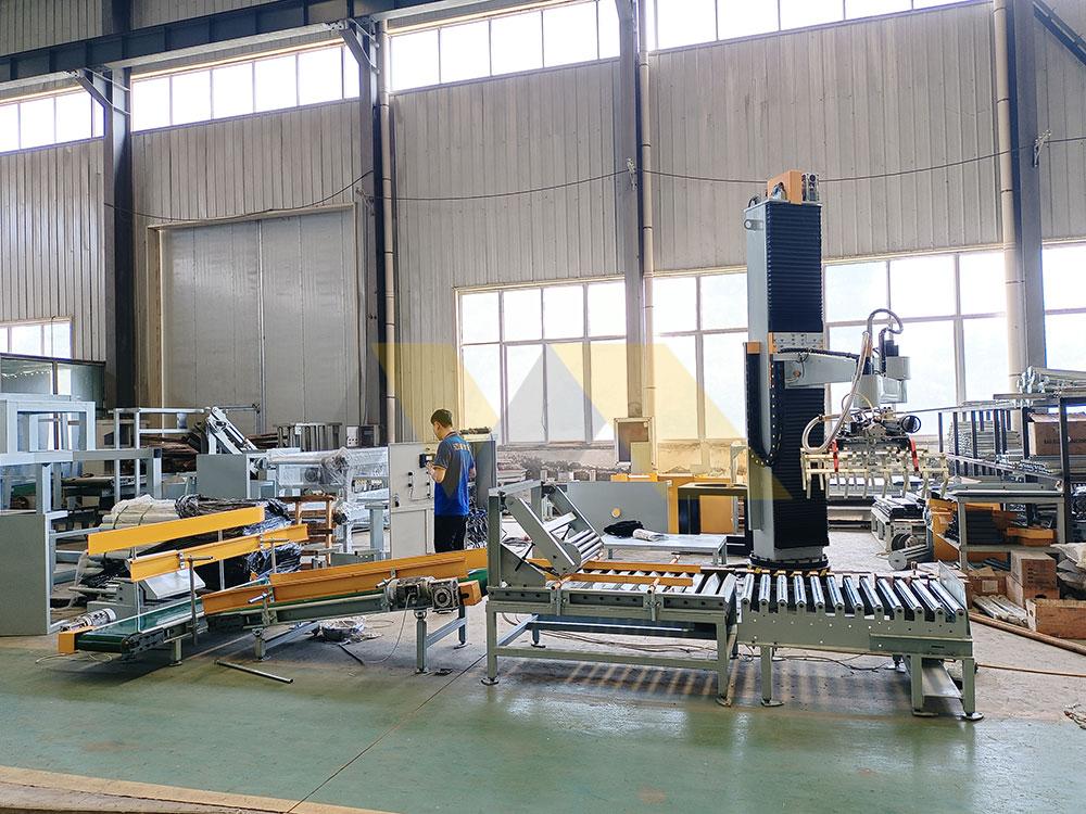 various palletizer machines working in factory setting palletizer machine