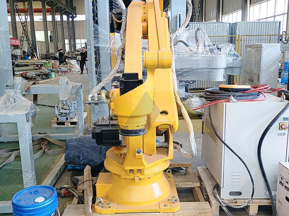 automated robotic palletizer arranging boxes in warehouse palletizer machine